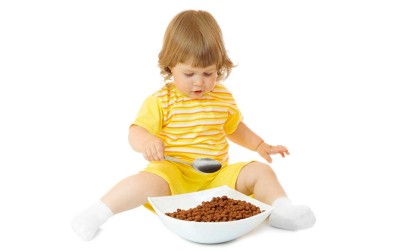 toddler-boy-eating-corn-flakes